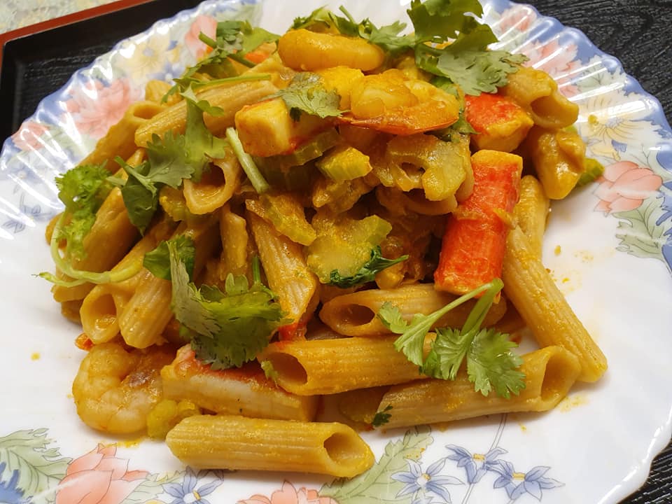 Penne with Seafood and Vegetables in Curry Flavour