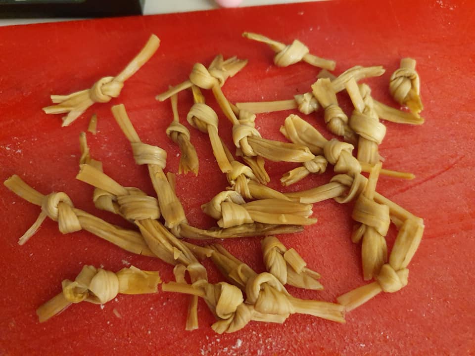 Dried Lily Buds remove hard part from end and tie to knots.