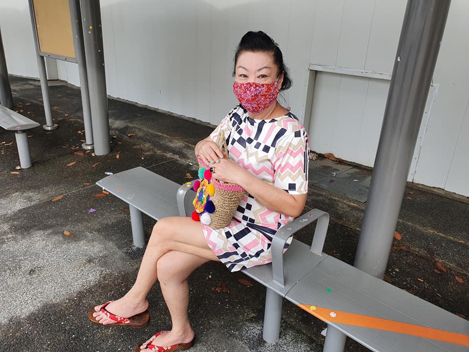 CATherina Hosoi at the bus stop