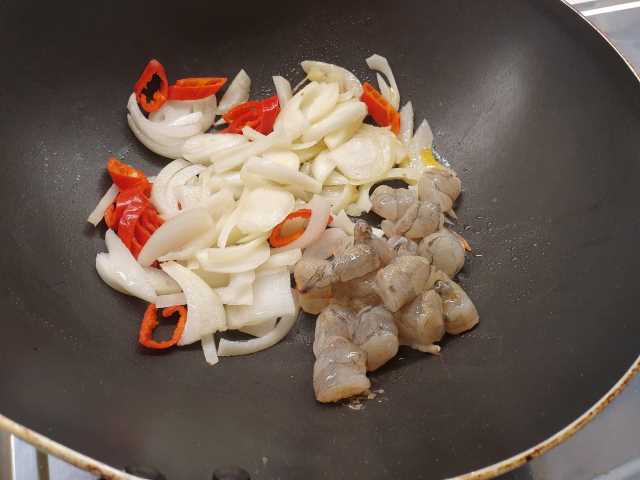 Frying the prawn onion mixture