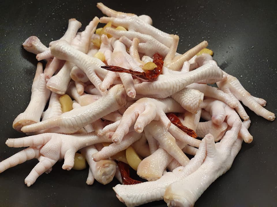 Adding Chicken Feet to cook