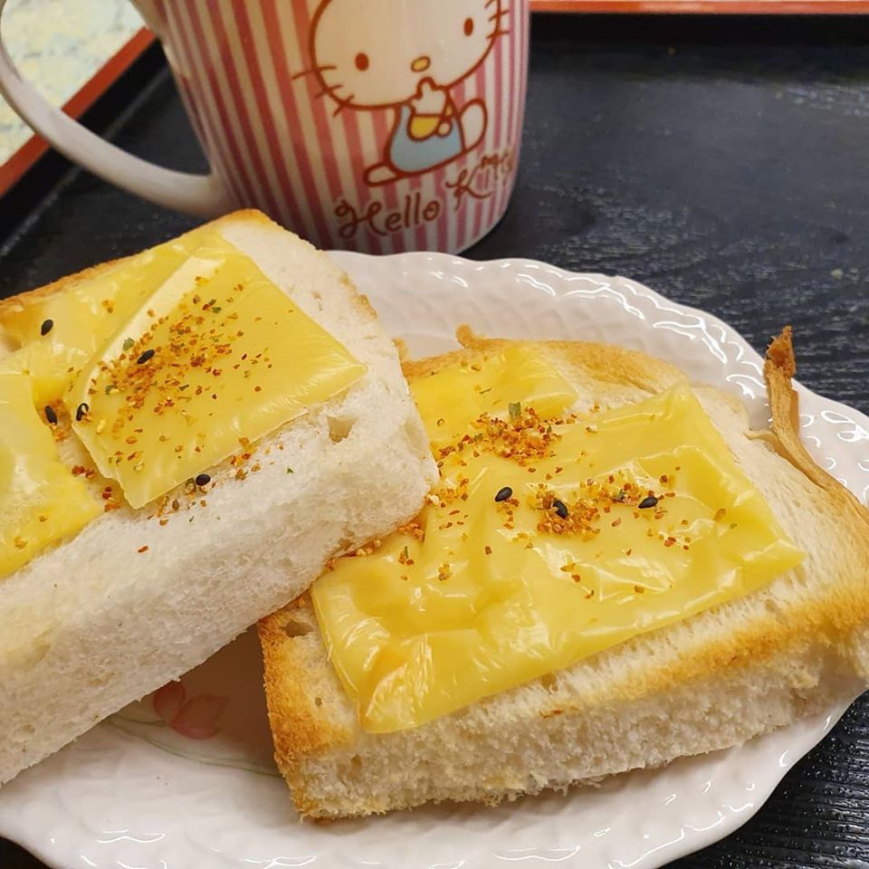 Hainanese Bread with a slice of Cheese and sprinkled with Yuzu flavour 7 Spice Chillie Powder