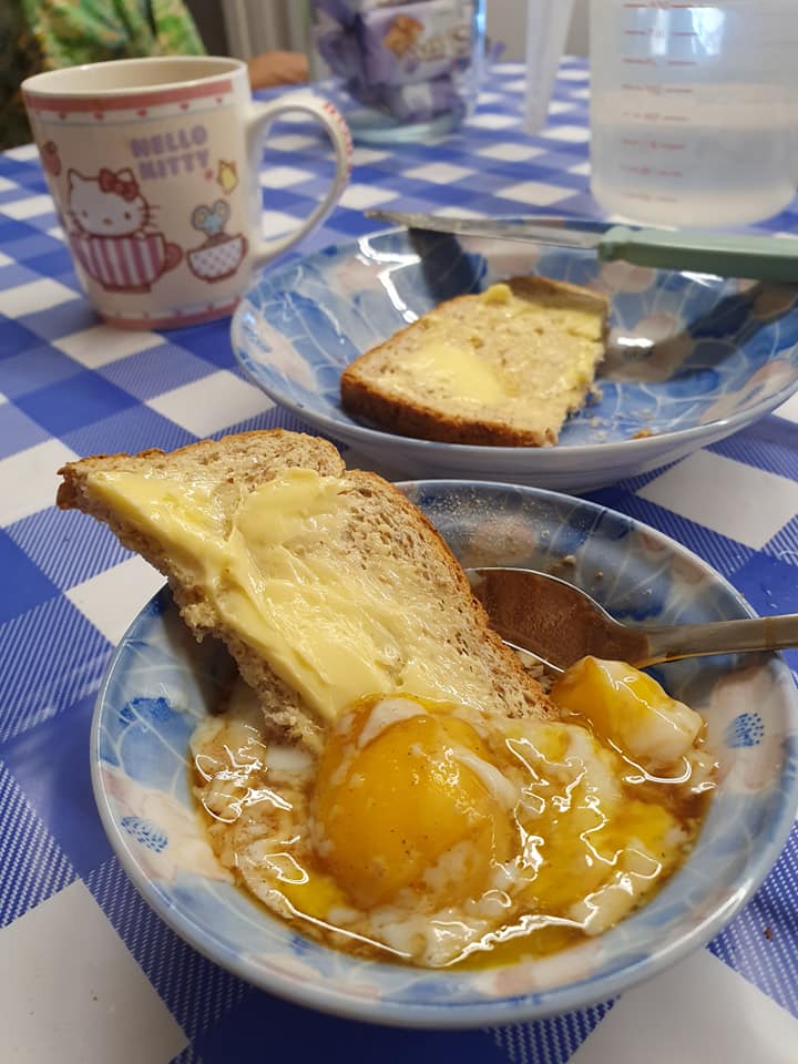 Toasted Bread with half boiled egg