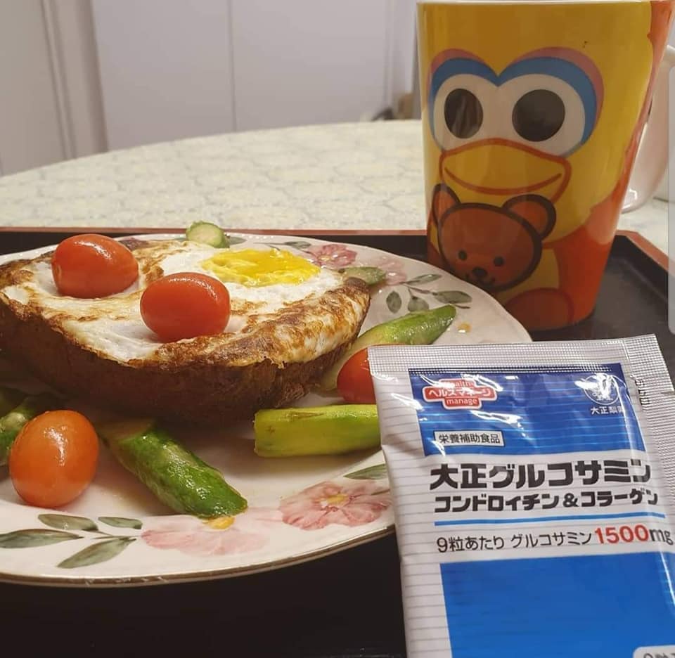 Healthy Breakfast set: Fried Egg with self made bread on bed of Asparagus & Cherry Tomatoes, one cup Nescafe Gao Siew Dai and my Glucosamine Supplements.