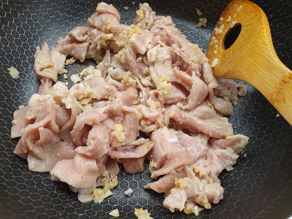 Add in meat slices, fry till cooked