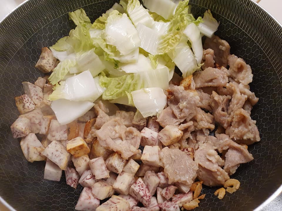Add in cooked slice pork with garlic