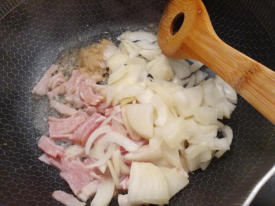 Adding Bacon and onion to butter and ginger paste